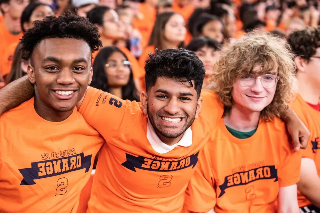 Students smiling inside the Dome.