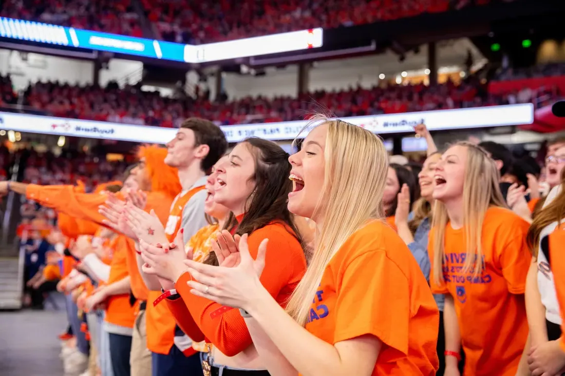 Students cheering at a game.