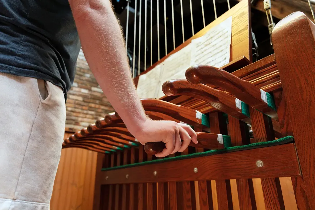 A person playing the chimes.